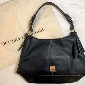 Dooney & Bourke shoulder bag with a beautiful red interior! Comes with dust bag